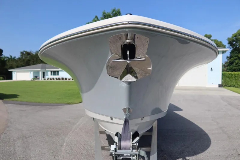 Slide: The Image of 2025 Sea Hunt Gamefish 28 Coffin Box boat on trailer, front view. - 7