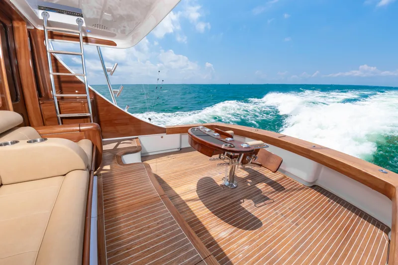 Slide: The Image of The image shows the deck of a 2022 Scarborough 63 yacht on the ocean. - 41