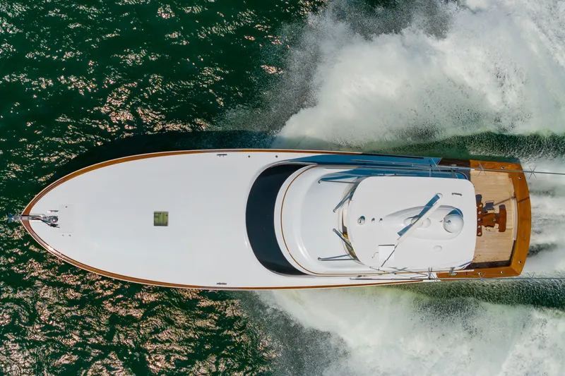Slide: The Image of Aerial view of a 2022 Scarborough 63 yacht speeding through the water. - 3