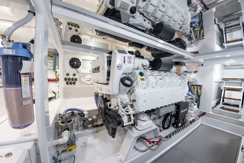 Slide: The Image of Engine room of the 2022 Scarborough 63, featuring modern machinery and tidy wiring. - 25
