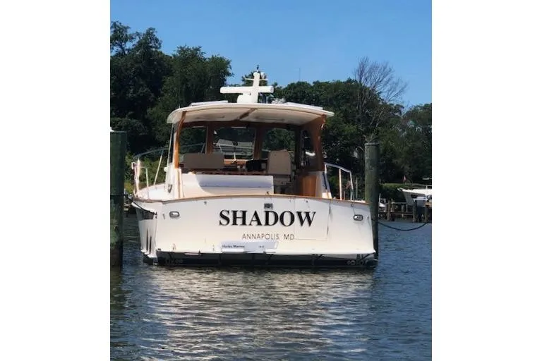 Slide: The Image of Rear view of 2002 Legacy Express boat named "Shadow" docked in Annapolis, MD. - 3