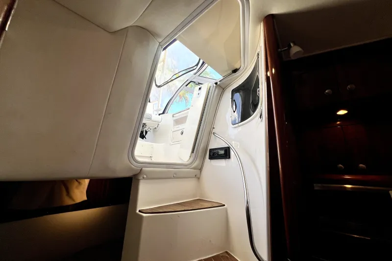 Slide: The Image of Interior view of 2004 Century 3200 Walk-Around boat, showing cabin stairs and doorway. - 65