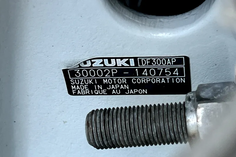 Slide: The Image of Suzuki DF300AP engine label on 2004 Century 3200 Walk-Around, made in Japan. - 79