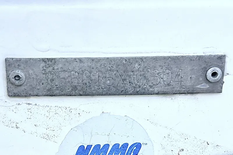 Slide: The Image of Metal identification plate on a 2004 Century 3200 Walk-Around boat. - 81