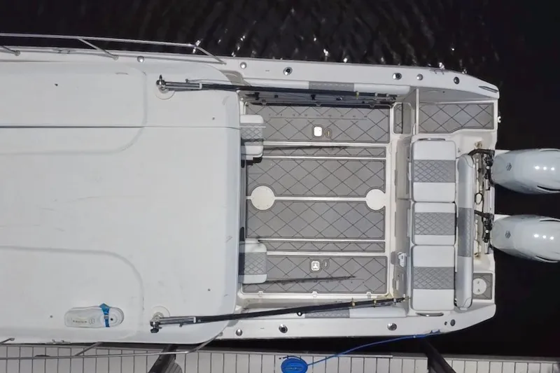 Slide: The Image of Top view of a 2004 Century 3200 Walk-Around boat with dual engines. - 10