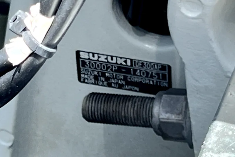 Slide: The Image of Label on Suzuki motor, model 30002P, attached to 2004 Century 3200 Walk-Around. - 77