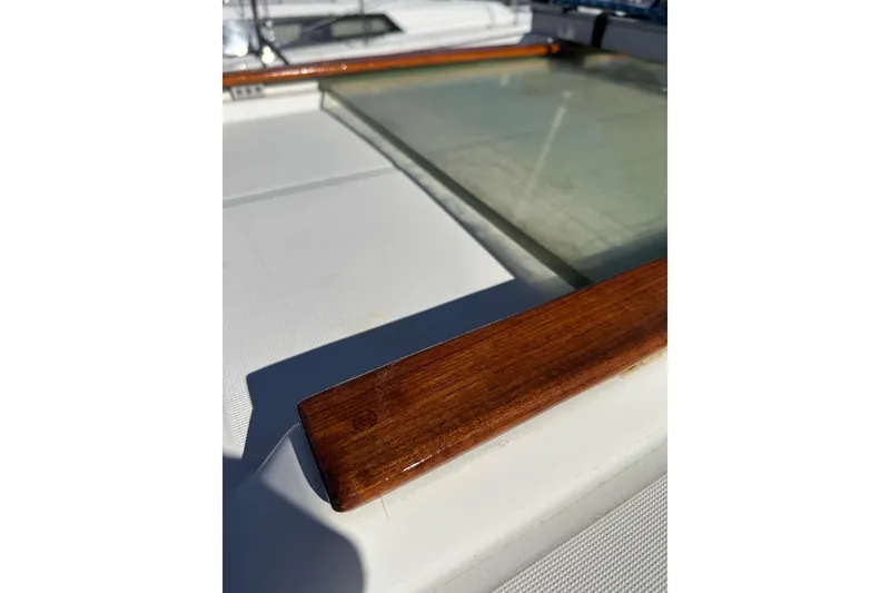 Slide: The Image of Close-up of Jeanneau Sun Odyssey 36.2 yacht deck with wooden trim, 2000 model. - 20
