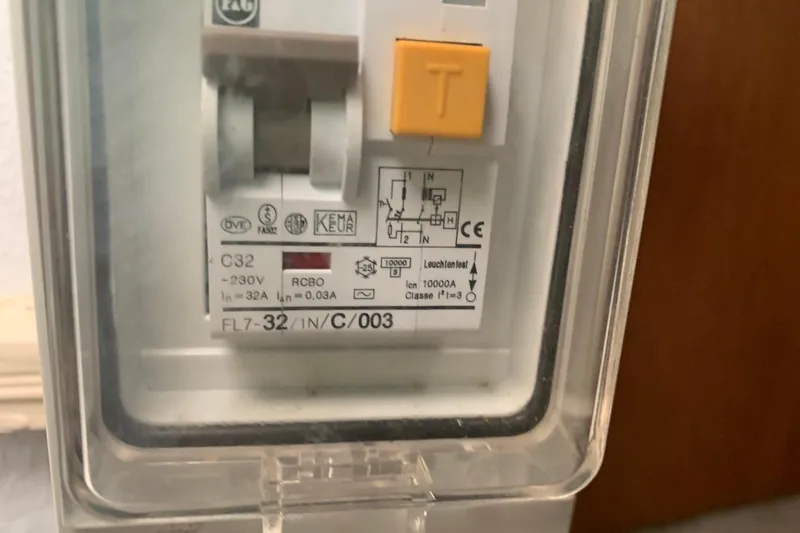 Slide: The Image of Electrical panel with RCBO switch on Jeanneau Sun Odyssey 37, 2000 model. - 14