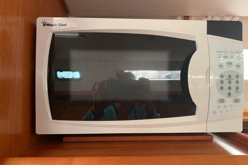 Slide: The Image of Magic Chef microwave inside a 2000 Jeanneau Sun Odyssey 37 yacht kitchen. - 29
