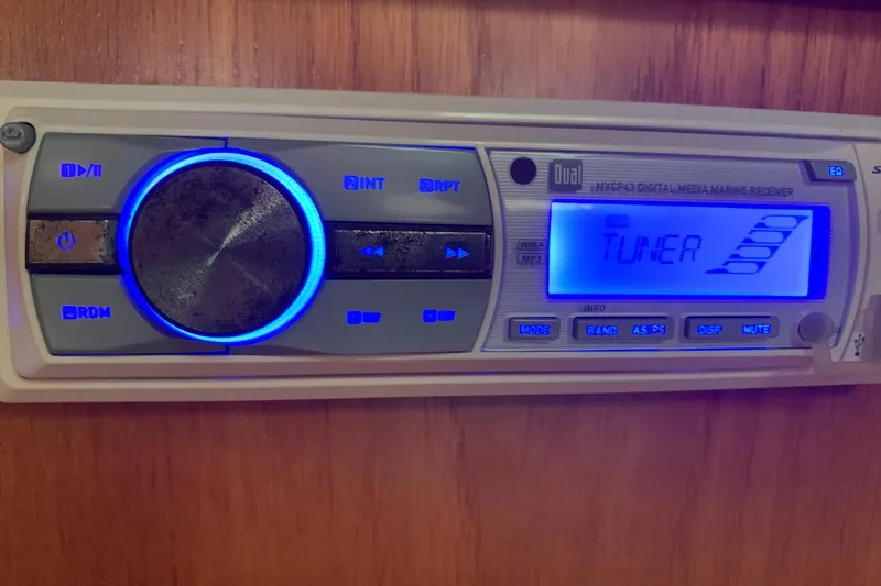 Slide: The Image of Marine stereo system on Jeanneau Sun Odyssey 37, 2000 model, displaying "Tuner" mode. - 45