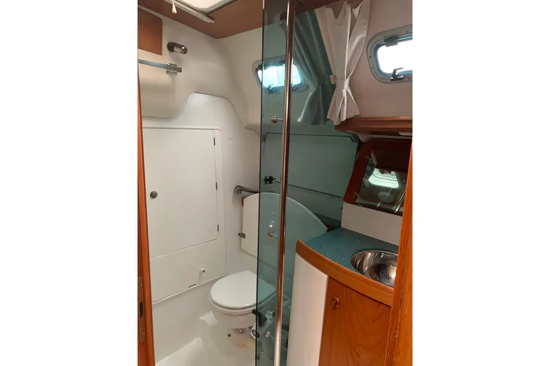 Slide: The Image of Interior of 2000 Jeanneau Sun Odyssey 37 yacht bathroom with shower and sink. - 36