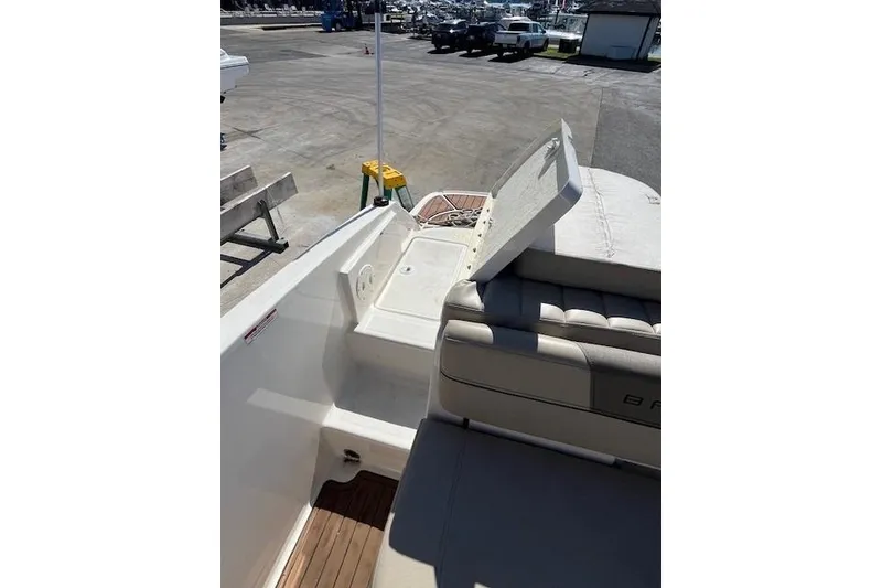 Slide: The Image of 2016 Bayliner VR5 Bowrider I/O boat interior with open storage compartment. - 8