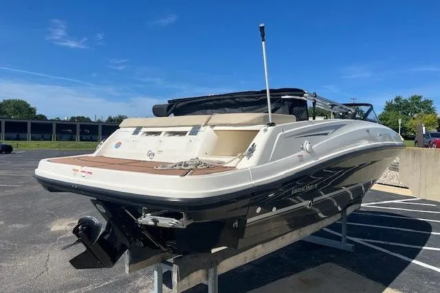Slide: The Image of 2016 Bayliner VR5 Bowrider I/O boat displayed outdoors on a sunny day. - 3
