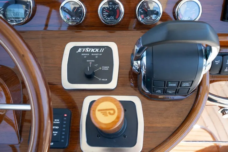 Slide: The Image of Hinckley Talaria 29C 2021 dashboard with JetStick II controls and gauges. - 11