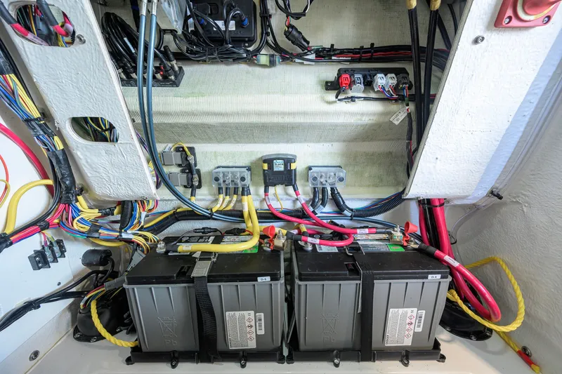 Slide: The Image of Electrical wiring and battery setup in a 2027 Sportsman Masters 227 Bay Boat. - 47