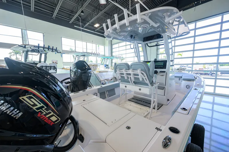 Slide: The Image of 2027 Sportsman Masters 227 Bay Boat in showroom, featuring Yamaha SHO VMAX engine. - 38