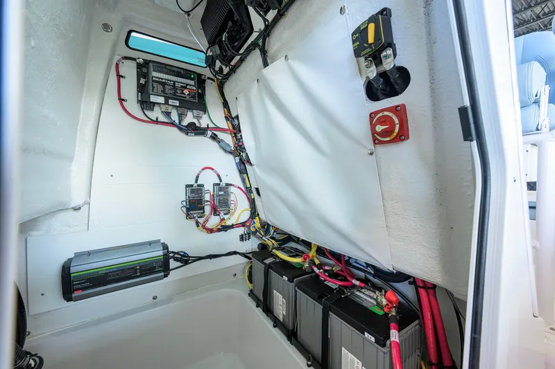 Slide: The Image of 2027 Sportsman Masters 227 Bay Boat electrical system with batteries and wiring. - 45