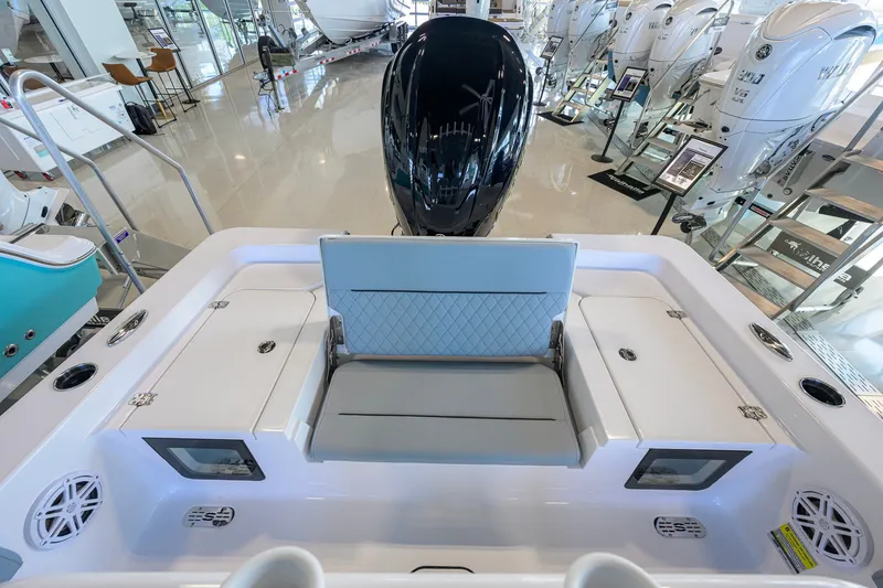 Slide: The Image of 2027 Sportsman Masters 227 Bay Boat interior with seating and storage compartments. - 33