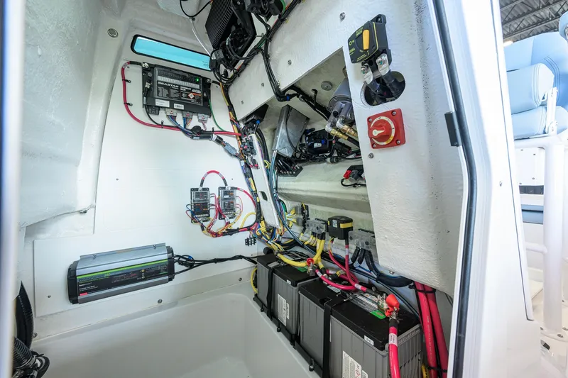 Slide: The Image of Interior view of 2027 Sportsman Masters 227 Bay Boat's electrical system and wiring. - 46
