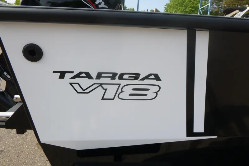 Slide: The Image of 2027 Tracker Targa V-18 Combo boat logo on side panel. - 18
