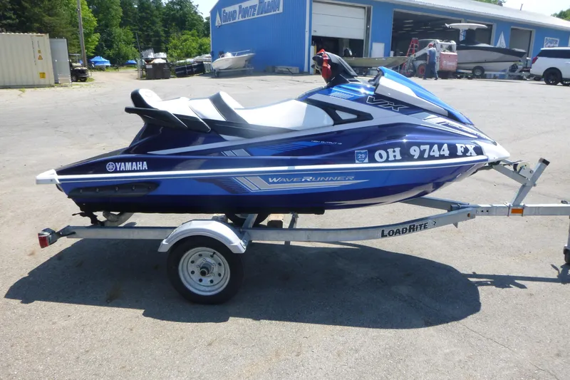 Slide: The Image of 2020 Yamaha WaveRunner VX Cruiser HO on trailer at a marina. - 1