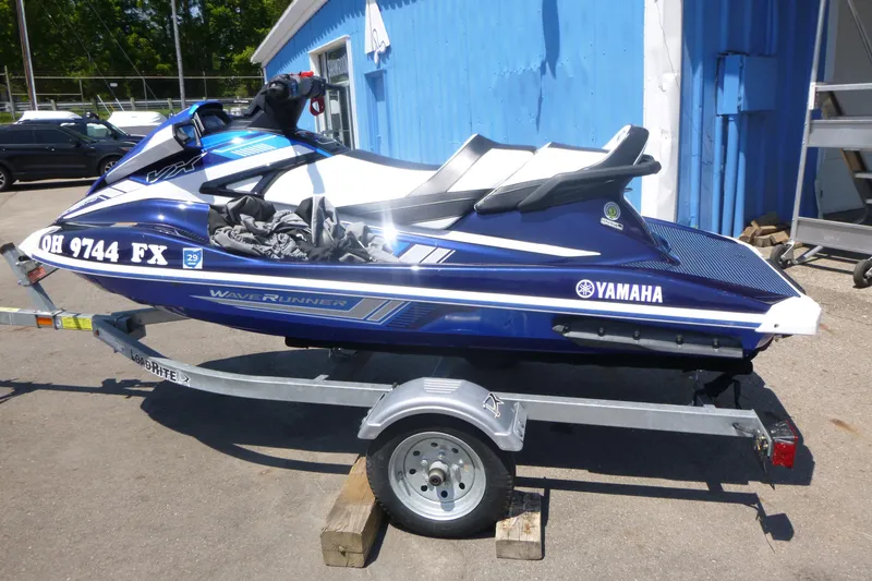 Slide: The Image of 2020 Yamaha WaveRunner VX Cruiser HO on trailer, parked outdoors. - 2