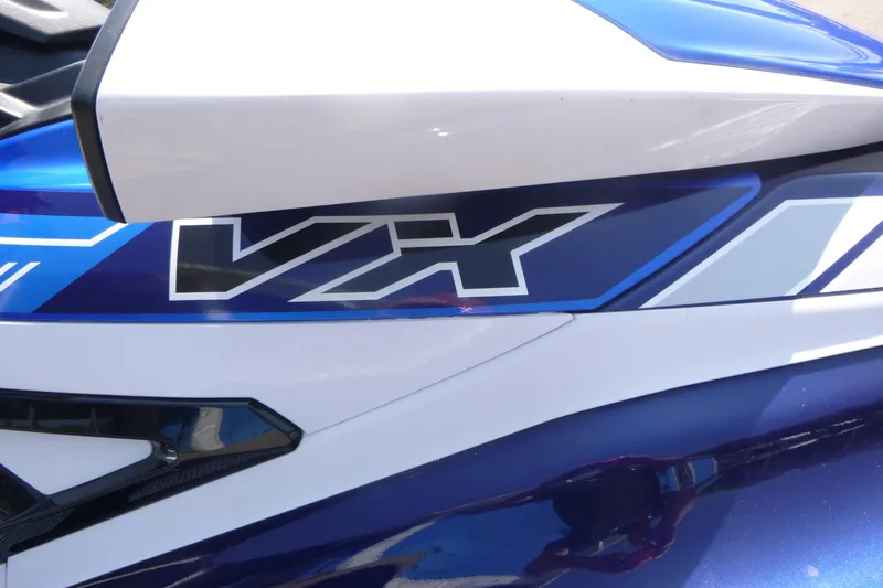 Slide: The Image of 2020 Yamaha WaveRunner VX Cruiser HO, close-up of sleek blue and white design. - 7