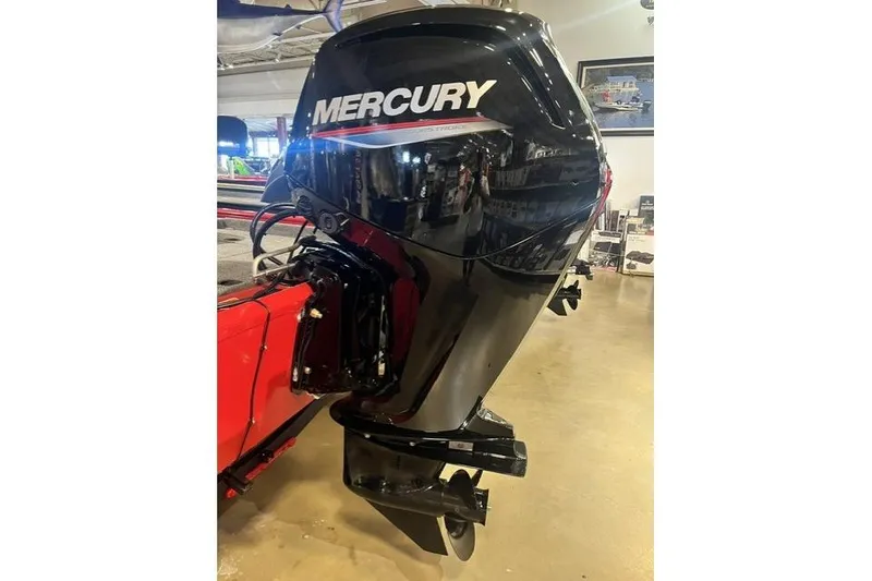 Slide: The Image of 2026 Tracker Pro Crappie 175 with Mercury outboard motor in showroom. - 6