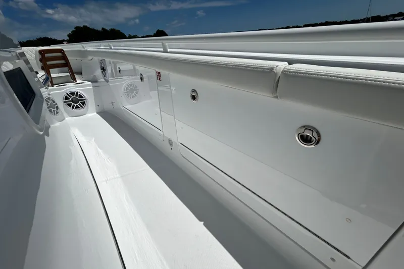 Slide: The Image of 2027 Everglades 315 Center Console boat interior with sleek white design and modern features. - 35