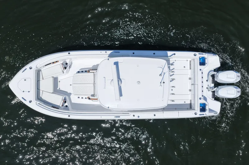 Slide: The Image of Aerial view of 2027 Everglades 315 Center Console boat on water. - 17