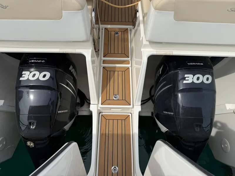 Slide: The Image of Two powerful 300 HP outboard engines are mounted on a 2013 Sea Ray 370 Venture. - 28