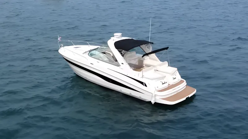 Slide: The Image of 2013 Sea Ray 370 Venture on calm waters. - 2