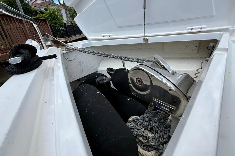 Slide: The Image of Anchor storage compartment on a 2018 Axopar 37 Sports Cabin boat. - 33
