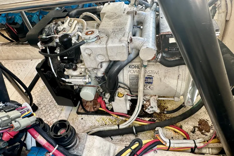 Slide: The Image of Engine compartment of a 2012 Tiara Yachts 3100 Coronet, featuring a Kohler power system. - 31