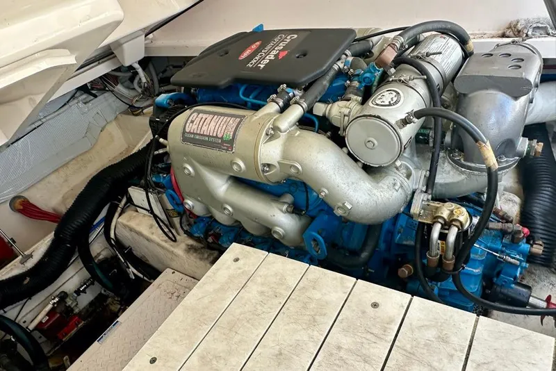 Slide: The Image of Engine compartment of a 2012 Tiara Yachts 3100 Coronet, showcasing detailed machinery. - 29