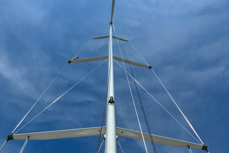 Slide: The Image of Sailboat mast against blue sky, Sabre 452, 1999 model. - 4