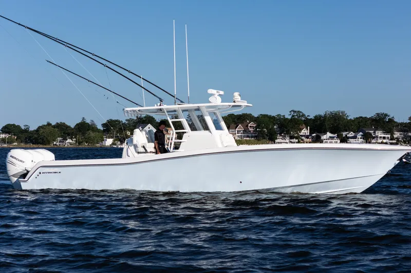 Slide: The Image of 2022 Invincible 39 Open Fisherman boat cruising on a sunny day. - 1