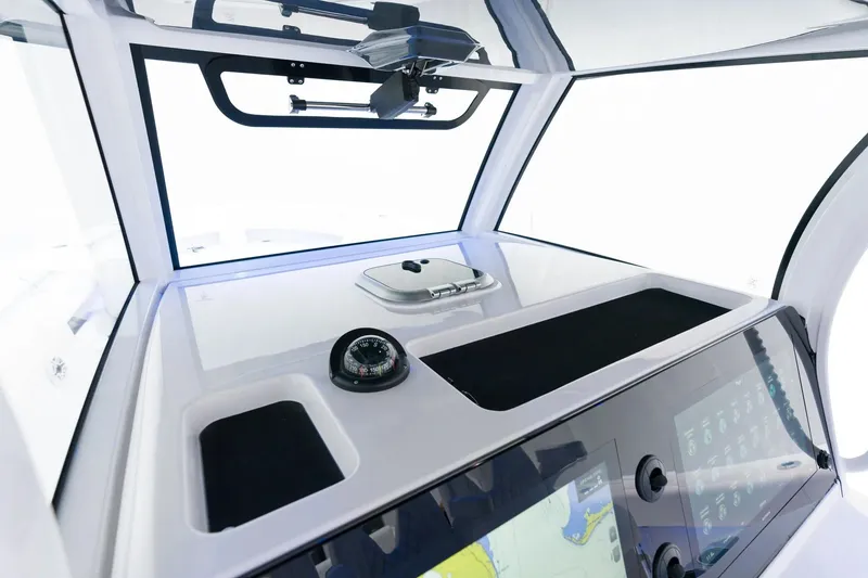 Slide: The Image of 2026 Sportsman Open 352 Center Console dashboard with navigation and control systems. - 14
