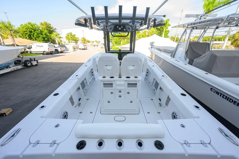 Slide: The Image of 2027 Sportsman Open 262 Center Console boat interior with seating and storage compartments. - 33