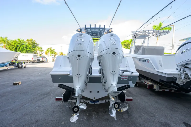 Slide: The Image of 2027 Sportsman Open 262 Center Console boat with dual Yamaha 250 V6 engines. - 3