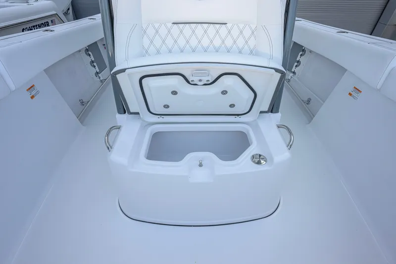 Slide: The Image of 2027 Sportsman Open 262 Center Console boat interior with open storage compartment. - 17