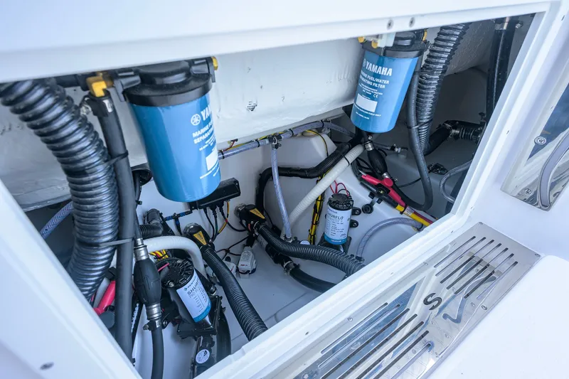 Slide: The Image of Engine compartment of 2027 Sportsman Open 262 Center Console with Yamaha filters. - 43