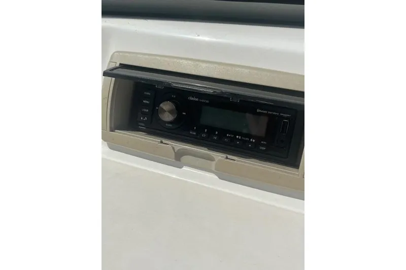 Slide: The Image of 2008 Stingray 195 LX boat stereo system with protective cover. - 16