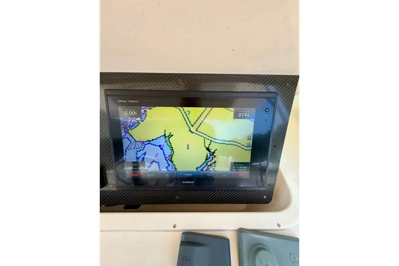 Slide: The Image of Garmin GPS display on 2011 Grady-White Canyon 366 boat dashboard. - 40