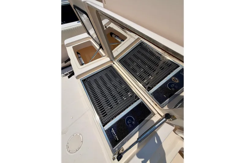 Slide: The Image of Grady-White Canyon 366 boat grill area, 2011 model, featuring dual grills. - 23