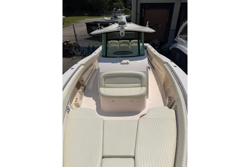 Slide: The Image of 2011 Grady-White Canyon 366 boat interior with seating and helm station. - 30