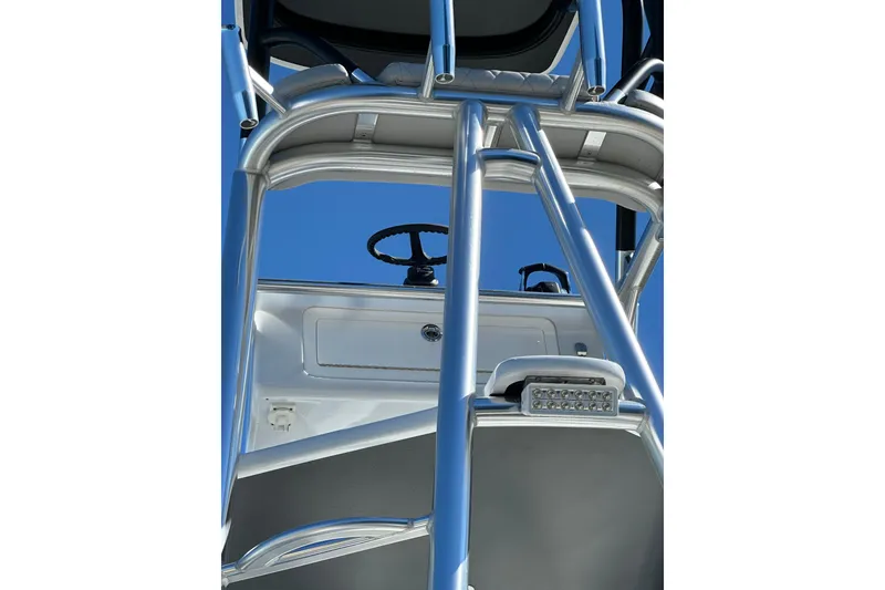 Slide: The Image of 2023 Freeman 42LR boat tower with steering wheel against clear blue sky. - 18