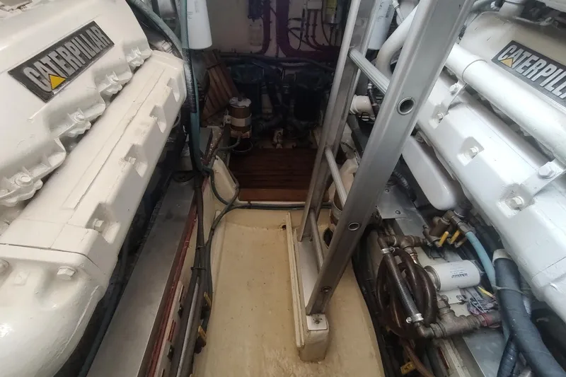Slide: The Image of Engine room of 1996 Grand Banks 40 Eastbay FB with Caterpillar engines. - 80