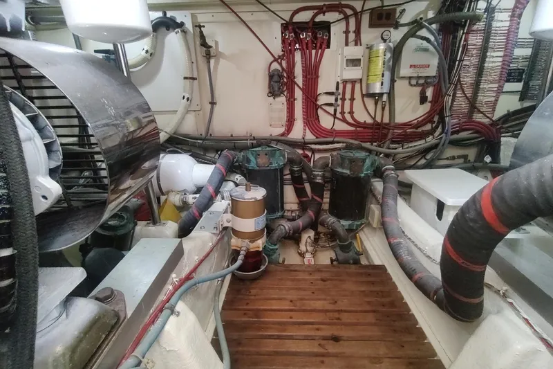 Slide: The Image of Engine room of 1996 Grand Banks 40 Eastbay FB with visible wiring and machinery components. - 75