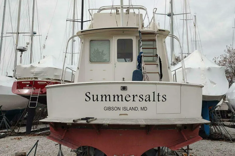 Slide: The Image of 1996 Grand Banks Eastbay 40 Flybridge boat named "Summersalts" in dry dock, Gibson Island, MD. - 119